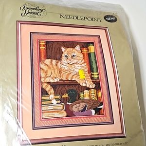 Needlepoint Cat on a Bookshelf.  Never opened.